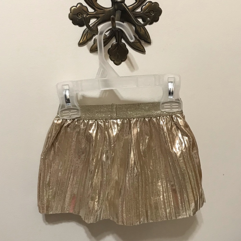 Carter’s Girl’s gold pleated skirt-Size 9m